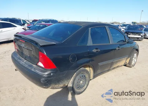 2004 Ford Focus Lx z USA, uszkodzony, nr VIN 1FAFP33Z94W194683